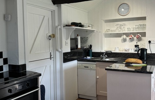 Bugford Apartment | Cosy cottage, rural location, beautiful landscaped gardens with pond and lake