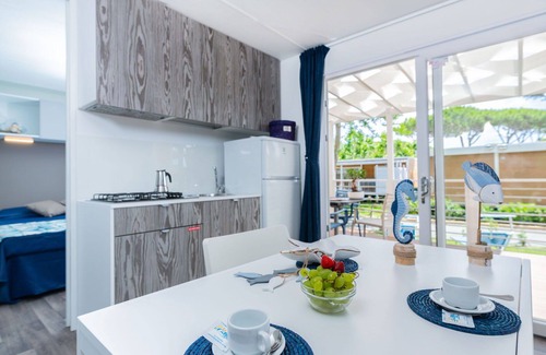 Le Rocchette House | Cosy apartment in villa for 3 guests with hot tub, WIFI, A/C, pool, TV, patio and parking