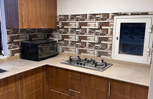 Rawalpindi Apartment | Cosy Sky-High Retreat: Ultimate Cityscape from the Top Floor