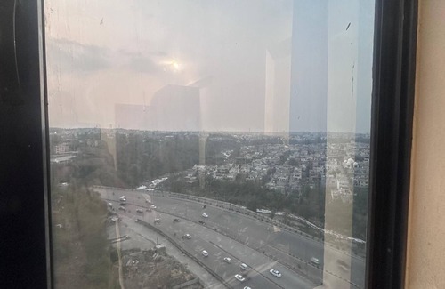 Rawalpindi Apartment | Cosy Sky-High Retreat: Ultimate Cityscape from the Top Floor