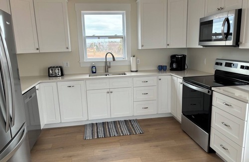 French Village Cottage | Cottage with breathtaking ocean views and direct beach access