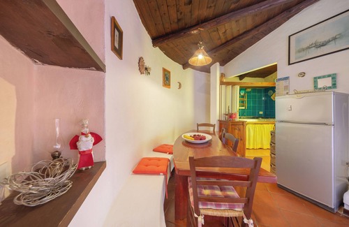 Baia Caddinas House | Cottage with Terrace and Sea View; Parking Available on Street