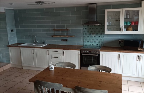 Meneac House | Countryside cottage with Nordic wood fired spa & above ground swimming pool