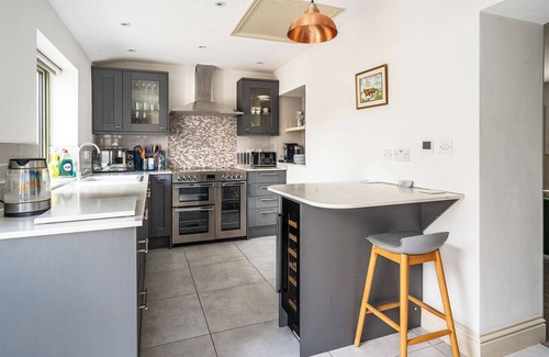 Melksham House | Countryside Granary cottage with access to indoor pool, sauna & steam room