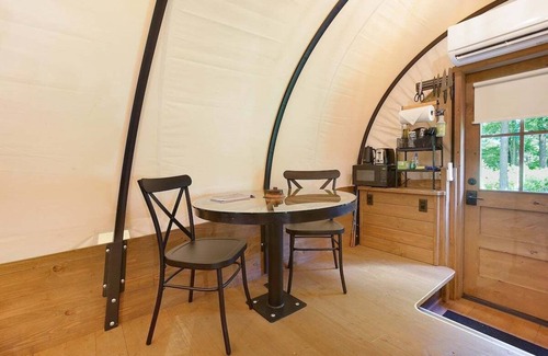 Strasburg RV Rental | Covered Wagon Camping w/Salt Water Hot Tub