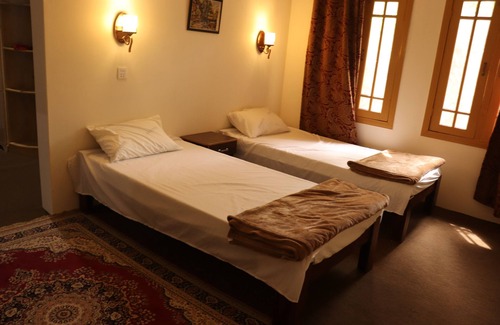 Gilgit Resort | Covered with Mountains - An organic & Natural Experience.