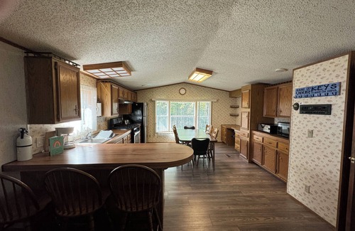 Lakewood House | Cozi retreat set in the woods within walking distance of Waubee Lake.