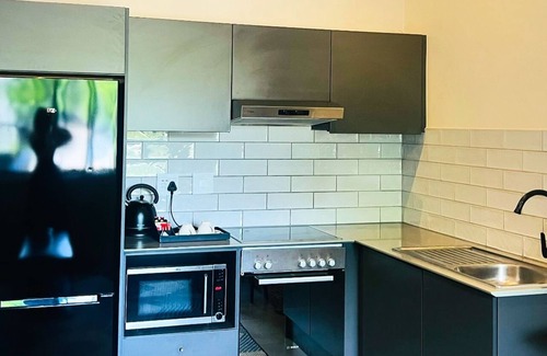 Sandown Apartment | Cozy 1-bedroom apartment with kitchen, gym, rooftop, WiFi in fantastic Sandton