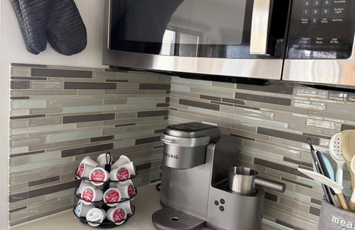 Vernon Apartment | Cozy 2-bedroom corner unit skyrise apartment with city views