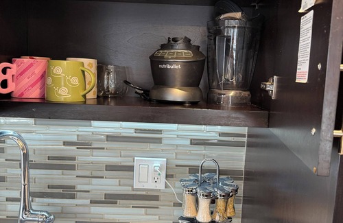 Vernon Apartment | Cozy 2-bedroom corner unit skyrise apartment with city views