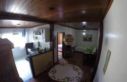 Downtown Buzios Apartment | Cozy apartment in the center of Búzios (bedroom and living room).