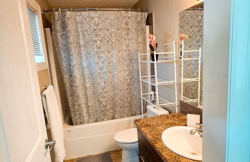 New Brighton House | Cozy bedroom in a townhouse in Copperfield Calgary