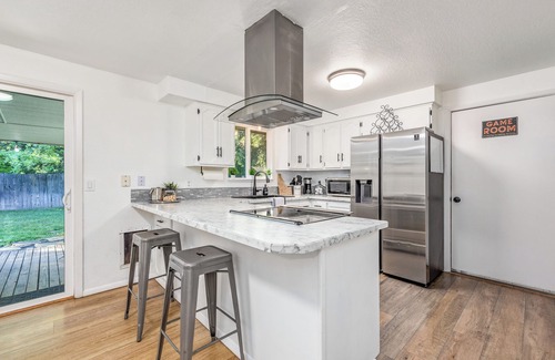 West Bench Cottage | Cozy Boise Gem: Private Yard, Game Room & Workspacen