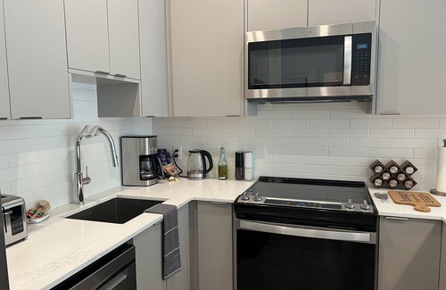 Revelstoke Condo | Cozy & bright mountain getaway. Enjoy a soak after a hard day's play!