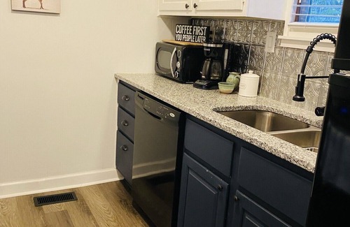 Sapphire House | Cozy Cabin with fireplace and screened in porch in Sapphire Valley.