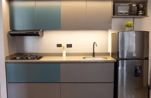 Estadio Apartment | Cozy Comfort at Rosa Negra Stadio Suite