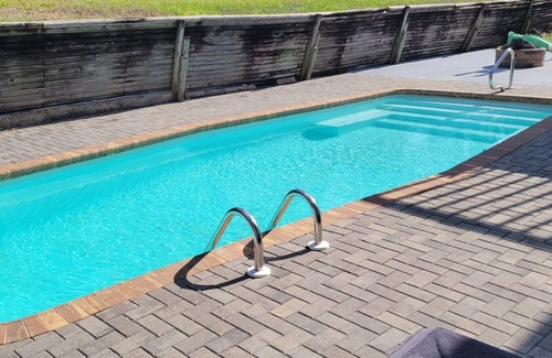 Marco Island Apartment | Cozy Couples Poolside Retreat close to everything from beach to shops and dining