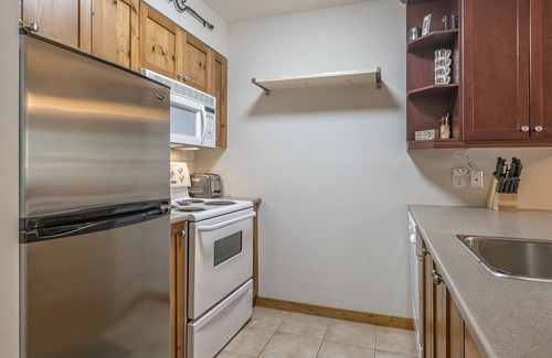 Silver Star Mountain Condo | Cozy ground floor Creekside Condo, pet friendly, shared hot tub, close to trails