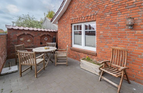 Neßmersiel Apartment | Cozy ground floor apartment with beautiful terrace