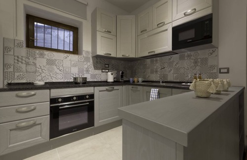 Passignano sul Trasimeno Apartment | Cozy apartment equipped with all comforts to accommodate up to 3 people. The flat is located in a renovated former period oil mill, which offers to its guests many shared services: access to the seasonal pool, small area used as a gym, playground and equ