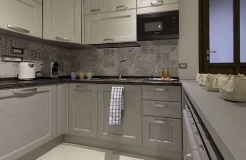 Passignano sul Trasimeno Apartment | Cozy apartment equipped with all comforts to accommodate up to 3 people. The flat is located in a renovated former period oil mill, which offers to its guests many shared services: access to the seasonal pool, small area used as a gym, playground and equ