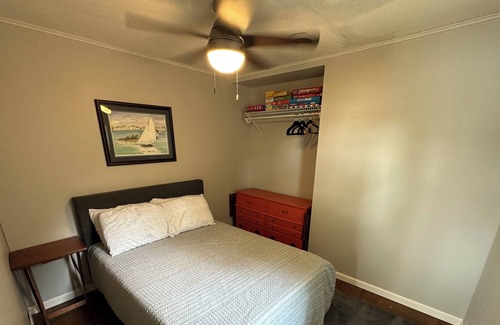 Sister Lakes House | Cozy Lakefront Cottage with Sunset Views, Private 60ft Dock & Water Toys