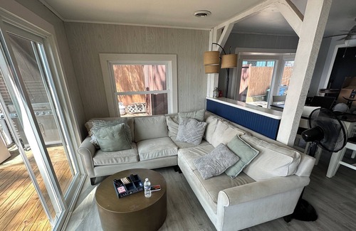 Sister Lakes House | Cozy Lakefront Cottage with Sunset Views, Private 60ft Dock & Water Toys