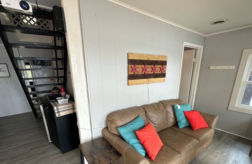 Sister Lakes House | Cozy Lakefront Cottage with Sunset Views, Private 60ft Dock & Water Toys