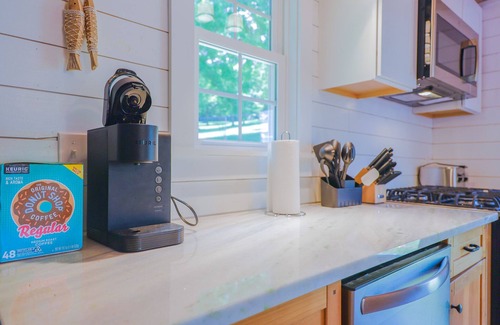 Hiwassee House | Cozy lakefront retreat with private dock, scenic views, updated interiors and serene outdoor seating