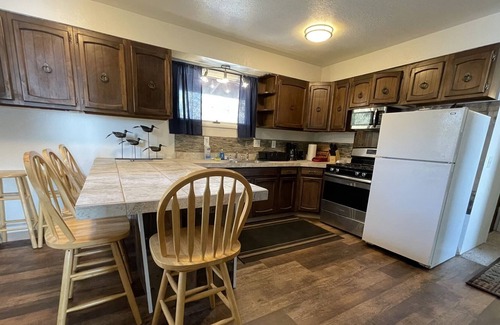 Salamatof House | Cozy Lodging and Breathtaking Views looking out over the Cook Inlet.