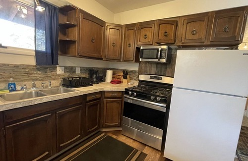 Salamatof House | Cozy Lodging and Breathtaking Views looking out over the Cook Inlet.