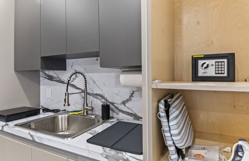 Richmond West Apartment | Cozy Luxury Room. Luxurious studio retreat with sleek design.