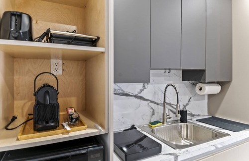 Richmond West Apartment | Cozy Luxury Room. Luxurious studio retreat with sleek design.