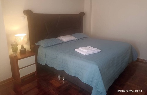 Puno House | Cozy room with TV and private bathroom
