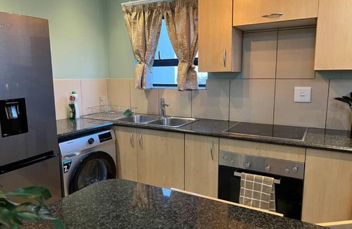 Greater Johannesburg Metropolitan Area Apartment | Cozy Self Catering Apartment with Golf Course Views, Jackal Creek Golf Estate