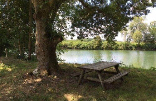 Coulonges Cottage | Cozy Stone House with Private Garden, Bikes, and Baby Equipment