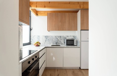 Sao Mamede de Infesta Apartment | Cozy T1 Flats with Courtyard BBQ by HostWise