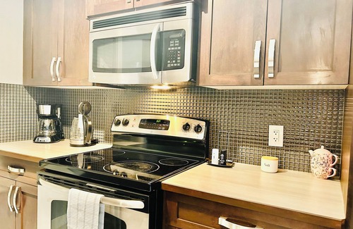 Leduc House | Cozy townhome