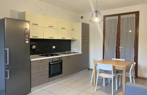 Villaggio Sereno Apartment | Cozy two-room apartment with garden, very close to the center