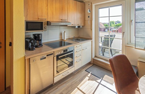 Westeraccumersiel Apartment | Cozy upper apartment Smutje with infrared cabin