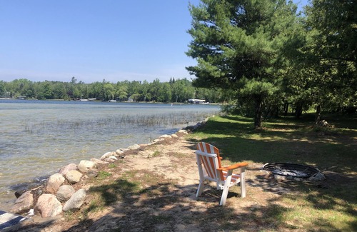 Lake Leelanau Cabin | Cozy waterfront sunset cottage on Lake Leelanau. Air, Near Leland.