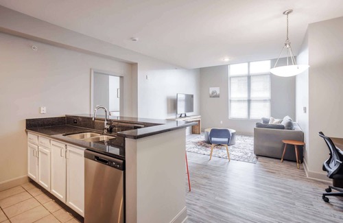 Central Business District Apartment | CozySuites at the Banks gym, pool 10