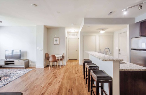 Central Business District Apartment | CozySuites at the Banks gym, pool 16