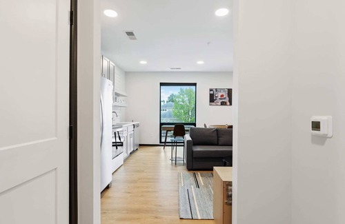 Lockerbie Square Apartment | CozySuites Mass with parking, lounge and roof deck 2