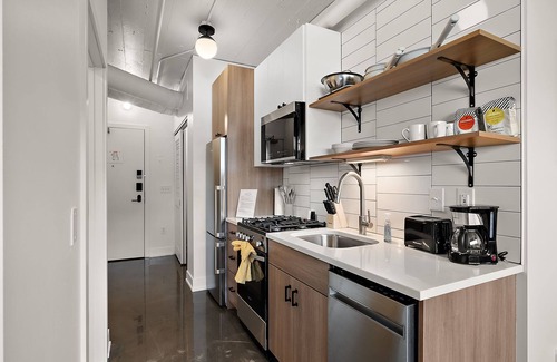 Warehouse District Apartment | CozySuites NLG with pool, bowling alley, sauna 27