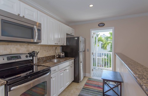 Truman Annex Condo | Craig & Cindy Key West Truman Annex Shipyard Condo with balcony at Mile Marker 0