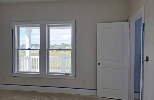 Pawleys Island House | Creek front beach house, elevator, saltwater pool, canal dock, dog friendly