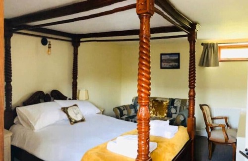 Wing House | Cumbrian Stone Barn With Hot Tub