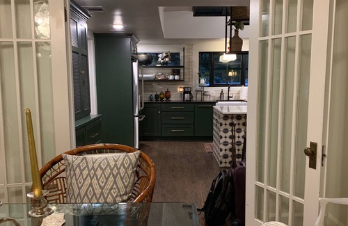Austin Ave. House | Curated boutique stay in a 1920s English bungalow. Modern twist on a classic!