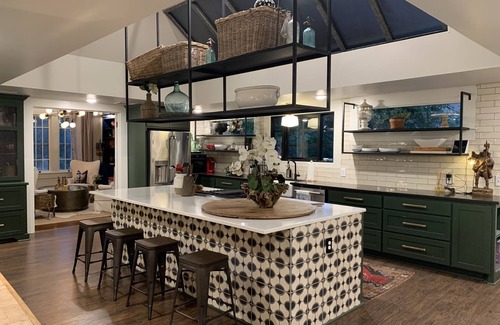 Austin Ave. House | Curated boutique stay in a 1920s English bungalow. Modern twist on a classic!